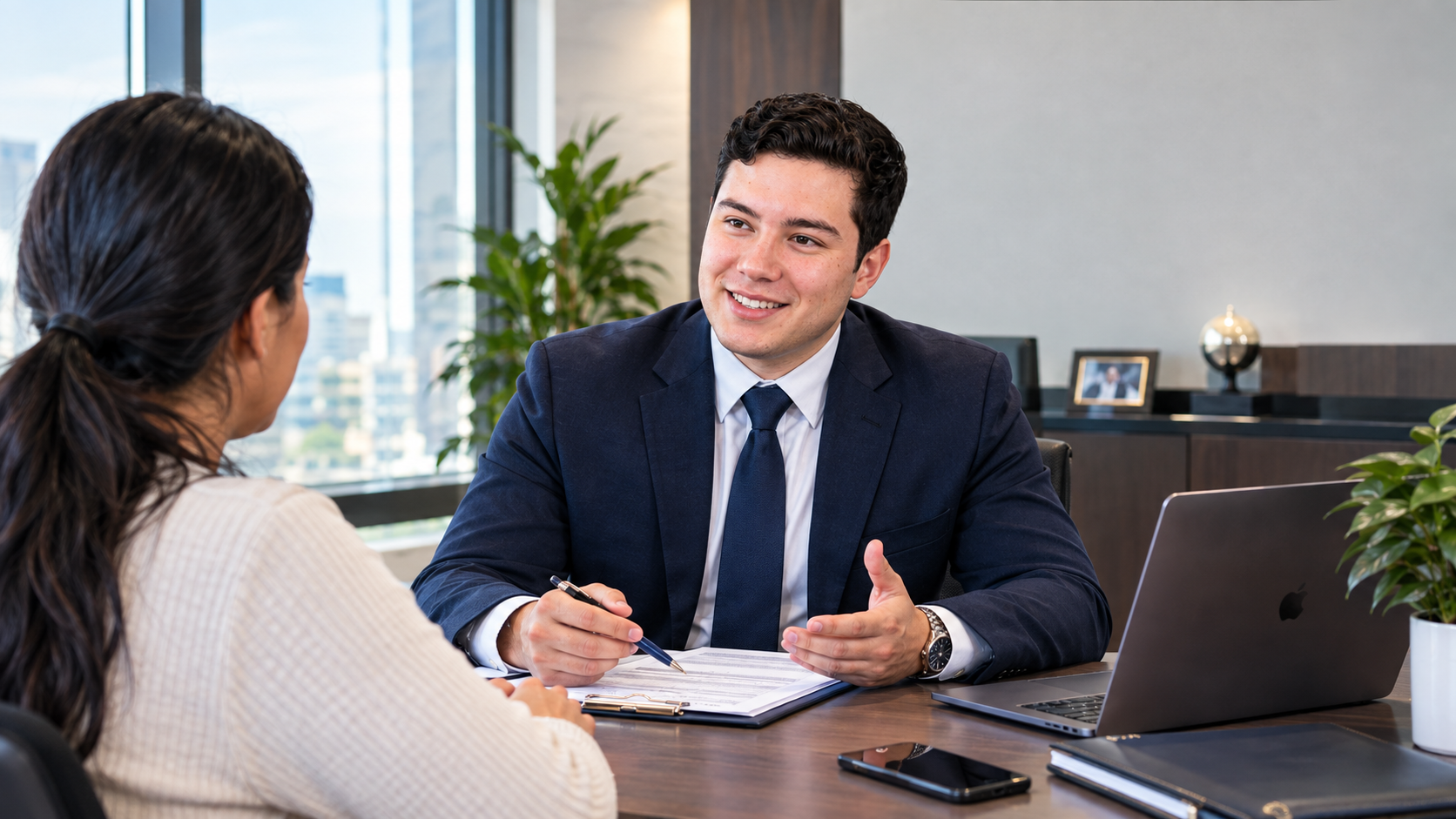 A Walls Advisory Group advisor speaking with a client during a consultation